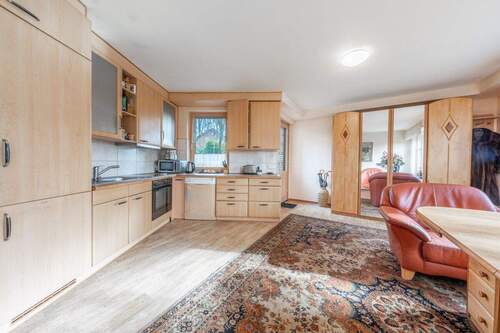 Der offene Wohn-/Küchenbereich der ersten Einheit - 9 Zimmer Mehrfamilienhaus, Wohnhaus zum Kaufen in Ibbenbüren