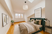 Schlafzimmer Beispiel - Helles Wohnen über den Dächern - Moderne 2-Zimmer-Dachgeschosswohnung mit Terrasse