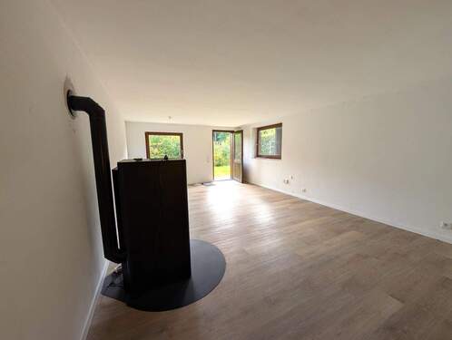 Wohnzimmer mit Kamin UG - 