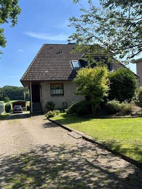 Straßenansicht - Einfamilienhaus mit 186,40 m&sup2; in Hanstedt zum Kaufen