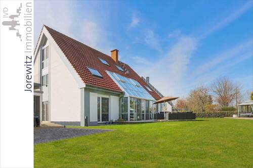 001 - Gartenansicht - Familienfreundliches Einfamilienhaus in Top-Lage von GT-Isselhorst (Spielstraße) mit schönem Garten