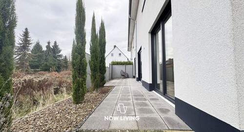 Terrasse - Hochwertige 2,5-Zimmer-Wohnung mit Terrasse und privatem Gartenanteil