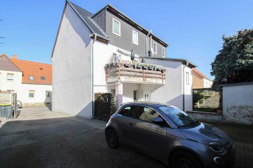 Hausrückansicht - Mehrfamilienhaus, Wohnhaus mit 243,30 m&sup2; in Staßfurt zum Kaufen