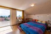 Schlafzimmer Dachgeschoss - Einfamilienhaus mit 118,00 m&sup2; in Hohenpeißenberg zum Kaufen