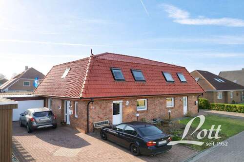 Bild 1 - +++ Vermietete Doppelhaushälfte mit Garage in gefragter Wohnlage von Augustfehn! +++