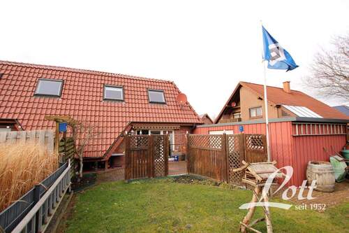 Gartenansicht - Doppelhaushälfte mit 101,40 m&sup2; in Augustfehn zum Kaufen