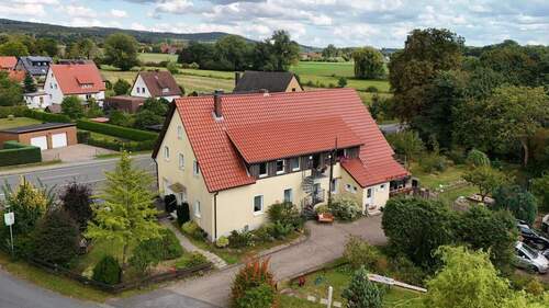 Luftansicht - 1 Zimmer Mehrfamilienhaus, Wohnhaus zum Kaufen in Borgholzhausen