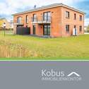 Titelbild EG links - Bezugsfertige EG-Wohnung (links) mit Terrasse und Garten!