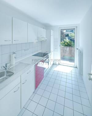 Küche mit Balkonzugang - 