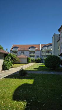 Innenhof - Wohnen zwischen Mainufer und Altstadt – 3,5-Zimmer-Wohnung mit Balkon und Tiefgarage in Kitzingen