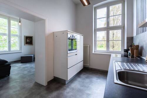 Küche und Blick ins Esszimmer - Etagenwohnung mit 113,00 m² in Putbus zum Kaufen