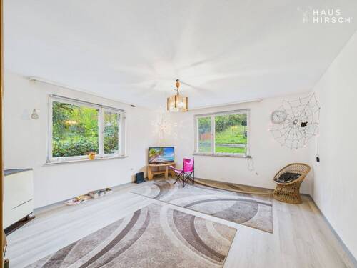 Wohnzimmer 1 - 1.OG - Mehrfamilienhaus, Wohnhaus mit 130,00 m&sup2; in Sulz am Neckar zum Kaufen