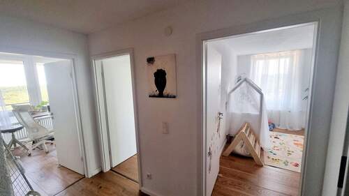 Gang mit Blick in die Zimmer - 