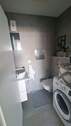 WC und Waschmaschine - 