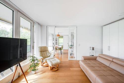 Wohnzimmer - AIGNER - Großzügige, moderne 5-Zimmer-Wohnung in ruhiger Lage von Starnberg