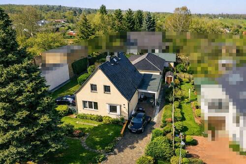 Titelbild - Familienfreundliches Mehrgenerationen-Ensemble mit vielseitigen Nutzungsmöglichkeiten