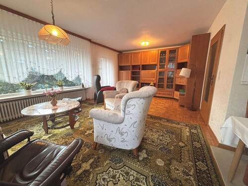 Wohnzimmer - Reihenendhaus mit 108,90 m&sup2; in Seelze zum Kaufen