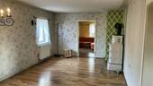 EG - Wohnzimmer mit Kachelofen - 
