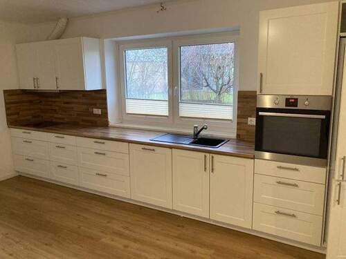 Küche Hauptwohnung - 7 Zimmer Einfamilienhaus zum Kaufen in Brekendorf