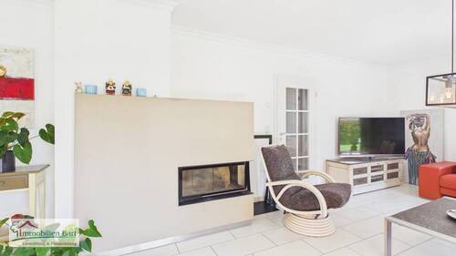 EG - Kaminofen in Wohn- und Esszimmer - 