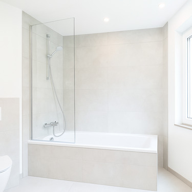 Bad in moderner Betonoptik - Helle Wohnung zum Erstbezug nach Kernsanierung im 1. OG mit Balkon und Ausblick!