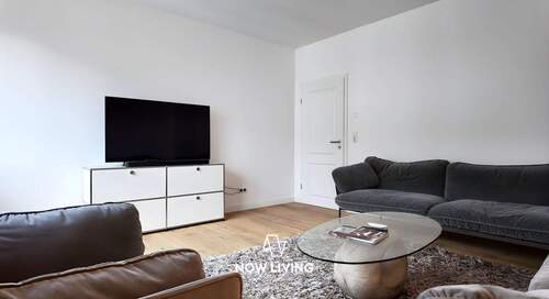 Wohnzimmer - Attraktive Stadtwohnung im Erstbezug nach Sanierung mit Balkon