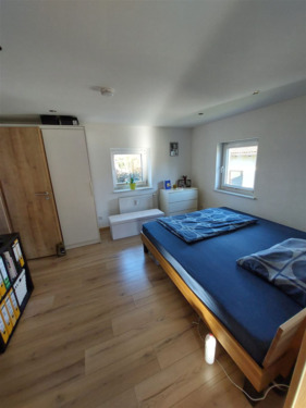 Schlafzimmer in der Wohnung im OG rechts - 