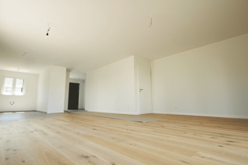 Der moderne Wohnbereich mit offener Küche - 4 Zimmer Doppelhaushälfte in Hamm