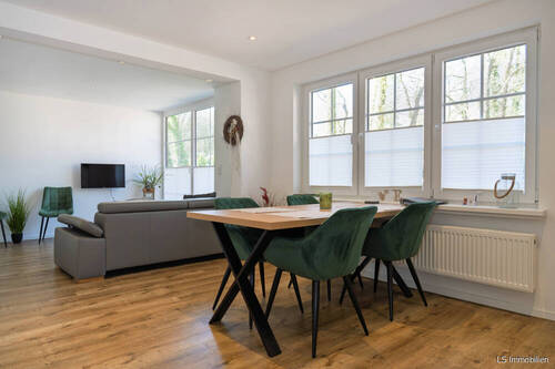 Wohnbereich - 3-Zimmer-Wohnung im Erdgeschoss mit Terrasse und Blick ins Grüne