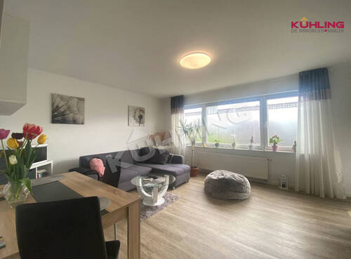 Wohnzimmer Archivbild - Etagenwohnung mit 82,00 m² in Vechta zum Kaufen