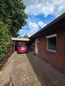Carport mit Zugang zum Garten/Gartenhaus - 