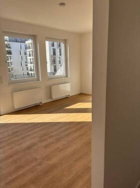 Wohnzimmer - lichtdurchflutete 2 Zimmerwohnung in ruhiger Lage