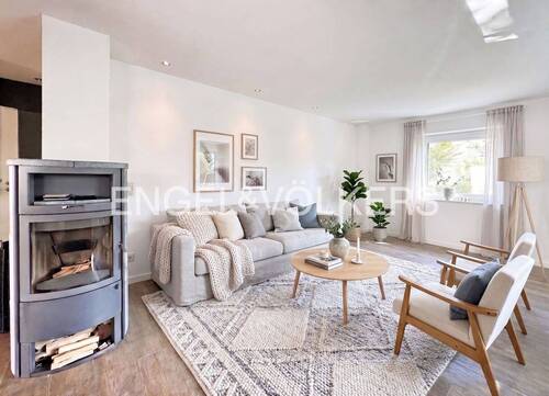 Wohnbereich mit Kamin - Renovierungsbeispiel - 2 Zimmer Etagenwohnung in Bad Nauheim
