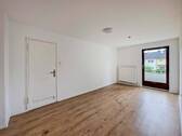Schlafzimmer mit Zugang zum Balkon - 