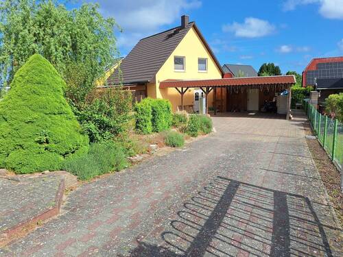 Ansicht - Einfamilienhaus mit Kamin und Doppelcarport in Wusterhusen bei Lubmin