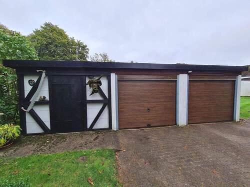 Das Garagengebäude mit angrenzendem Geräteschuppen - Einfamilienhaus mit 124,00 m&sup2; in Lindewitt zum Kaufen