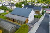 Aufnahme aus der Vogelperspektive - 4 Zimmer Einfamilienhaus in Bad Endbach