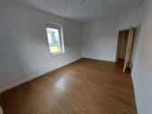 das Wohnzimmer - 2 Zimmer Etagenwohnung in Geringswalde