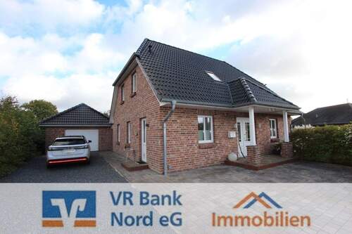 Bild 1 - Energetisch hochwertiges Einfamilienhaus mit Garage in attraktiver, familienfreundlicher Lage