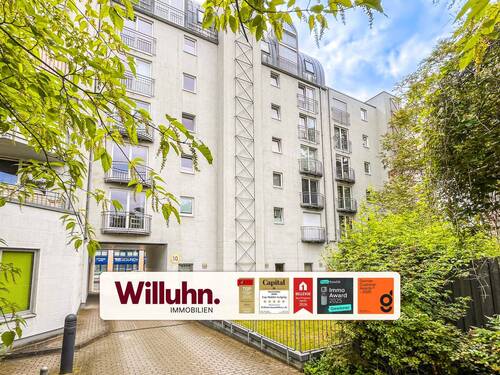 Hausansicht - Citynah & komfortabel: Helle 2-Zimmer-Wohnung mit Balkon, Lift & Tiefgarage