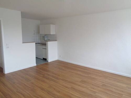 Wohnen Blick in Kochbereich - 1 Zimmer Etagenwohnung in Bielefeld