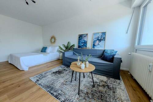 Wohnbereich mit Bett - 