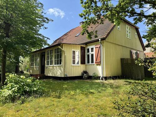 Hausansicht mit Veranda - Einfamilienhaus mit 159,00 m² in Prerow zum Kaufen