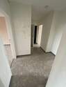 Flur - Etagenwohnung mit 67,80 m&sup2; in Verden (Aller) zur Miete