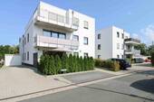 Straßenansicht - Moderne, barrierearme 3-Zimmer-Neubauwohnung mit Garten, Garage & Top-Ausstattung - zentral in Ahlen