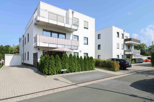 Straßenansicht - Moderne, barrierearme 3-Zimmer-Neubauwohnung mit Garten, Garage & Top-Ausstattung - zentral in Ahlen