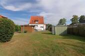 Garten und Carport - Einfamilienhaus mit 113,50 m² in Hessisch Lichtenau zum Kaufen