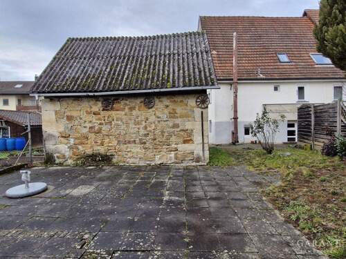 Terrasse mit Werkstatt - 