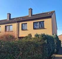 Ahlener Innenstadt, ein Reihenendhaus mit kleinem Garten, Vollkeller und Garage.