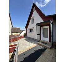 Anwesen in Buchen-Götzingen. Einfamilienhaus mit Nebengebäuden und Garagen etc.